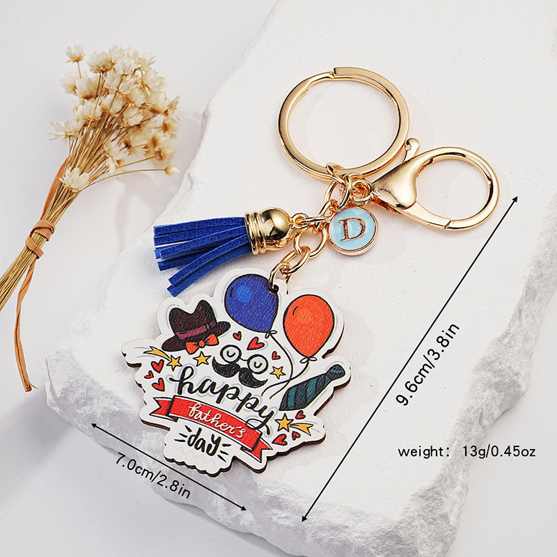 Impresión al por mayor de dibujos animados de metal Día del padre Tassel Keychain